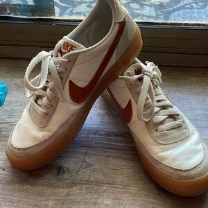 Nike women’s size 6.5 white and tan Leather sneakers. Good shape. Clean